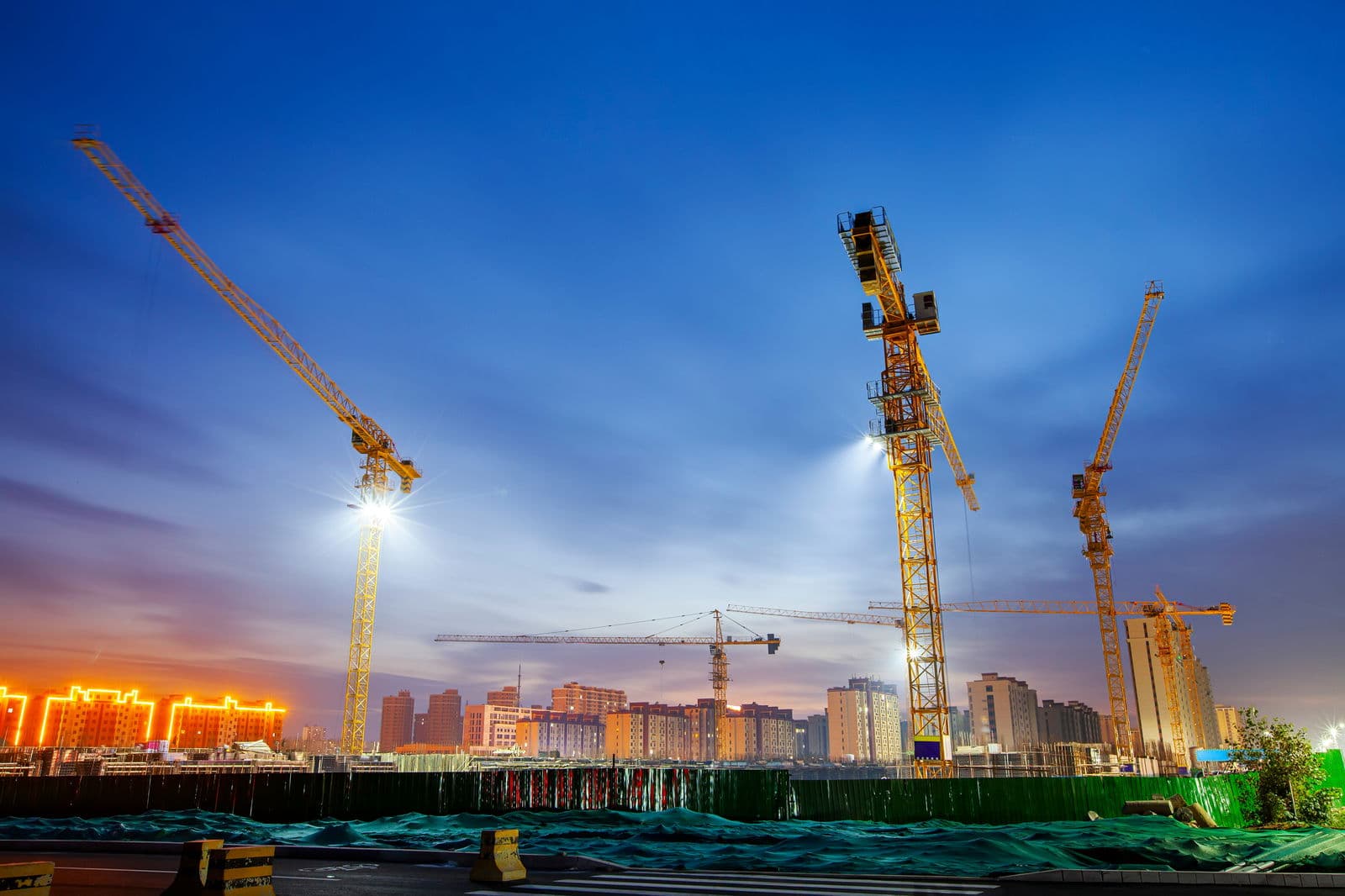 Decarbonizing global construction supply chains: policies, practices, and potential